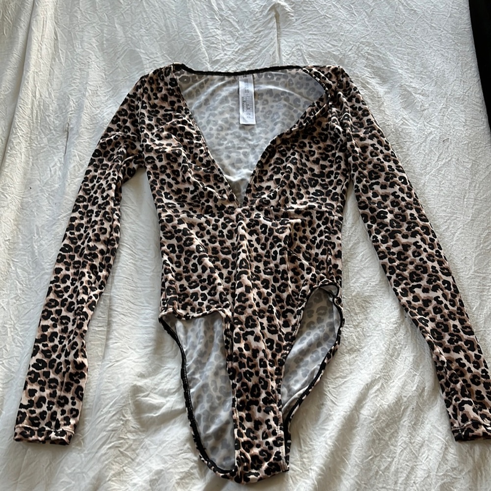Never worn cheetah print bodysuit